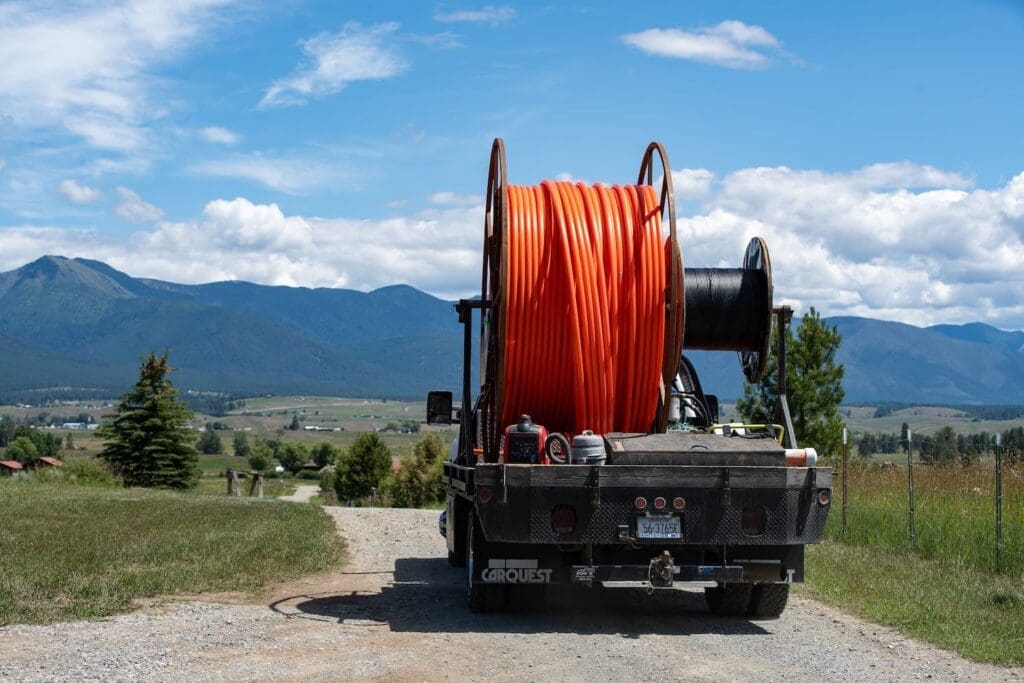 Truck transporting fiber optic cable to support high-speed fiber internet in Lincoln County