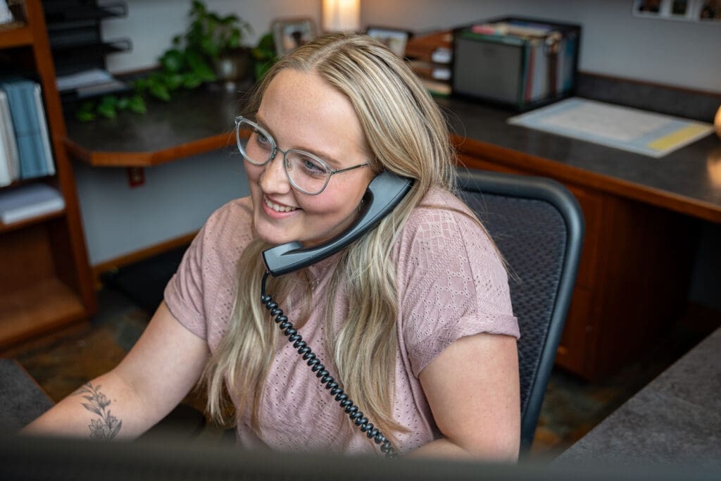 InterBel staff providing 24/7 business support for hosted phone solutions and business communication services